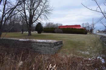 The proposed 120-foot monopole, if approved, would be erected on this parcel of land on Camden Street in Rockland, next to Pizza Hut. (Photo by Sarah Thompson)