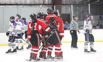 The Camden Hills ice hockey team during its Feb. 19 game. (Courtesy Molly Cole)