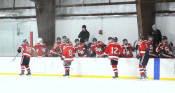 The Camden Hills ice hockey team during its Feb. 19 game. (Courtesy Molly Cole)