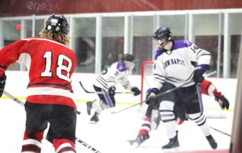 The Camden Hills ice hockey team during its Feb. 19 game. (Courtesy Molly Cole)