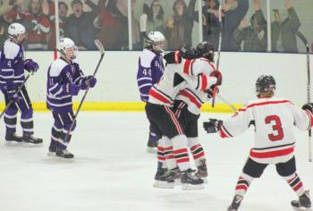 The Camden Hills ice hockey team in its Feb. 15 game against Hampden Academy. (Courtesy Molly Cole)
