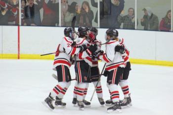The Camden Hills ice hockey team in its Feb. 15 game against Hampden Academy. (Courtesy Molly Cole)