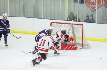 The Camden Hills ice hockey team in its Feb. 15 game against Hampden Academy. (Courtesy Molly Cole)