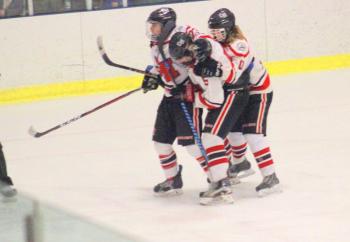 The Camden Hills ice hockey team in its Feb. 15 game against Hampden Academy. (Courtesy Molly Cole)
