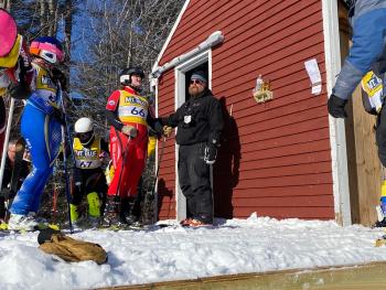 Camden Hills alpine skier Katelynn Colbry and coach Barry King at the KVAC championship Feb. 8. (Courtesy Mike Smith)