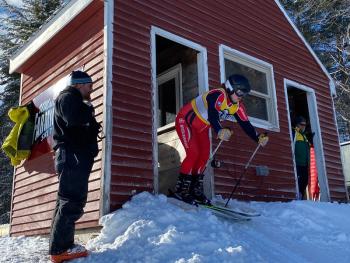 Camden Hills alpine skier Katelynn Colbry and coach Barry King at the KVAC championship Feb. 8. (Courtesy Mike Smith)