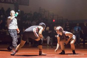 A scene from the girls wrestling state championships Feb. 19. (Courtesy Sean Carnell)