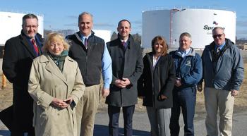 From left, Representative Scott Cuddy, Governor Janet Mills, Tim Theriault, VP of Materials Handling for Sprague, Dan Burgess, Commissioner Heather Johnson, Commissioner Bruce Van Note and Searsport Town Manager James Gillway.