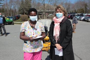 Grace Wagithuku, CNA, left, with regional chief operating officer, Cindy Wade, RN. (Photo courtesy Quarry Hill)