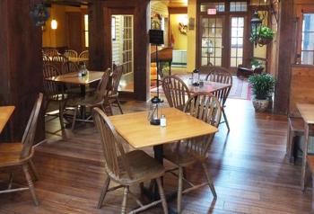 An empty dining room at Oliver’s Bistro will stay empty this summer, due to the state’s new coronavirus health restrictions in the restaurant industry. (Photo courtesy Oliver’s Bistro)