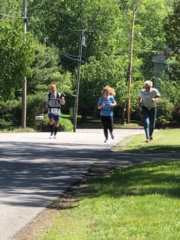 Abigail Nathan and her father, Jeff, running a graduation day half-marathon. (Courtesy Christine Nathan)