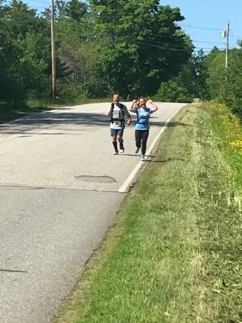 Abigail Nathan and her father, Jeff, running a graduation day half-marathon. (Courtesy Christine Nathan)