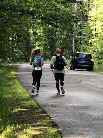 Abigail Nathan and her father, Jeff, running a graduation day half-marathon. (Courtesy Christine Nathan)