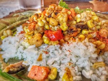 Mé Lon Togo Stew (Vegetarian): Savory stew made with sweet potato, plantain, eggplant, zucchini, portobello and shiitake mushrooms, celery, garbanzo beans, and spices Photo courtesy Mé Lon Togo