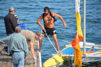 Sailor Brendan Browne was in the cold Maine waters for some time, trying to upright his capsized boat. (Photo by Lynda Clancy)