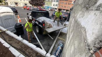 Camden Public Works get the capsule ready for burial. (Photo courtesy Alison McKellar)