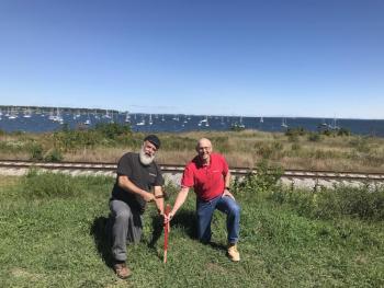 Sculptor Jay Sawyer (aka JBone) and fellow Maine Maritime Academy alum Mark Curtis identify the site of an “El Faro Salute!” memorial proposed for Rockland. (Photo courtesy Jay Sawyer)