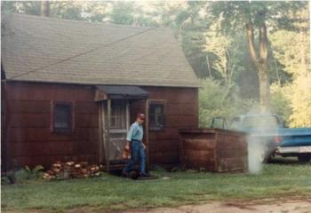 Hal Stowell exiting his cabin in Wendell. Photo: Eric Green