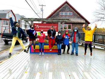 Artists and Project Interns jump for joy at the small outdoor celebration event held in late October. (Photo courtesy RSU 13 Adult & Community Education and Arts in Action)