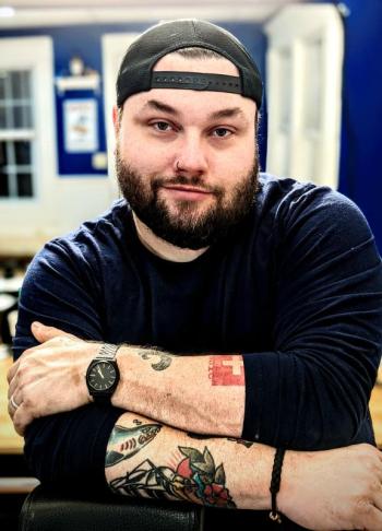 Sam Weldon, owner of Dark Harbor Barber Company. (Courtesy photo)