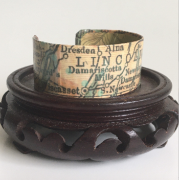 Wiscasset cuff sample: Cuff bracelets made from old charts and maps by Whimsy’s Mira Coleman will be among the unusual items for sale in the Holiday Gift Shop, during Wiscasset Holiday Marketfest, Dec. 4 - Dec. 6. (Photo courtesy Mira Coleman)