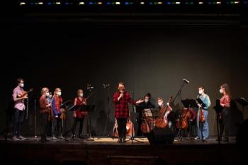 Waldo Executive Director Kate Fletcher introduces Palaver Strings at the first live-streamed performance from the Theatre’s stage November 12, 2020. (Photo by Anna Finocchiaro)
Photo 2: Waldo volunteers, working in masks, recently replaced hundreds of lightbulbs in the Theatres famous 1930s acoustic panels in preparation for the installation of a new house- lighting dimmer system. Photo credit: Barbara Boardman