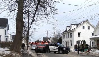 Main Street in Rockland is closed while firefighters and EMS tend to injured following a vehicle rollover into a house Feb. 18. (Photo by Sarah Thompson)