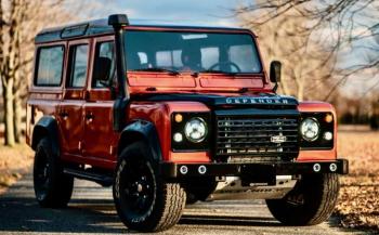 A Land Rover Defender 110 from 1993, modified with a custom interior, LED lights, a diesel engine and a snorkel for deep water. Bringatrailer.com