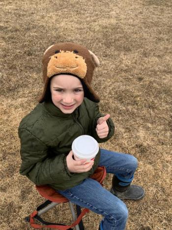 Carter Spicer enjoys a cup of hot cocoa. (Photo courtesy Thomaston Grammar School)