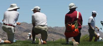 Cole Anderson seen walking, far right, during opening day of the NCAA Division I men’s golf national championship. Two of his Florida State coaches are in white while his father, Derek, is in red. (Courtesy Holly S. Anderson)