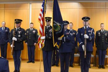 Maine's Army and Air National Guard Honor Guard present the colors during the national anthem. (Photo by Master Sgt. Travis Hill/Maine National Guard)