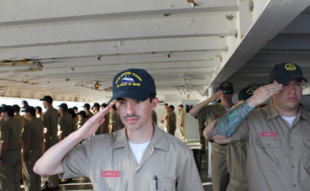Students present arms when passing the site of ‘El Faro.’ (Photo courtesy Maine Maritime Academy)