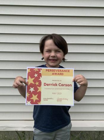 Derrick Corson receives a Perseverance Award. (Photo courtesy Thomaston Grammar School)