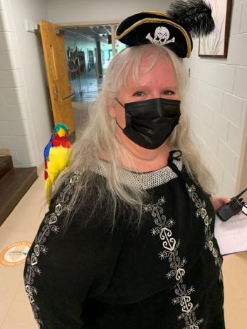 Ms. Giusto and her pet parrot. (Photo courtesy Thomaston Grammar School)