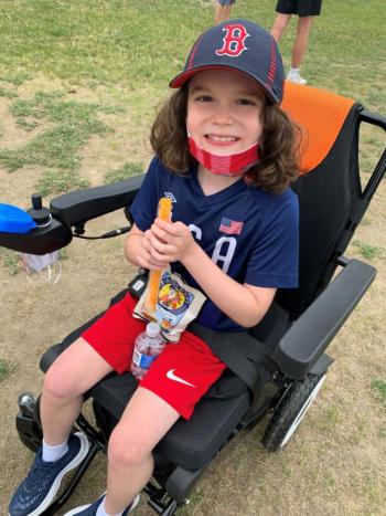 Liam Riley enjoys a snack on Field Day. (Photo courtesy Thomaston Grammar School)