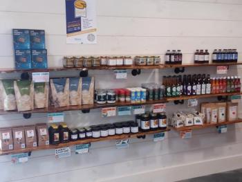 The retail section in the tasting room, which contains many of the products used in the small plates. Photo by Kay Stephens