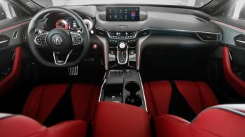 The Type S cockpit is an enhanced version of the already upmarket new TLX cabin. Note Acura’s unique push/pull-button gear changer, below the silver knob, and the computer touchpad with wrist rest, on the console alongside the cupholders.