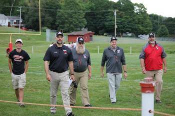The Camden Hills football coaches during its Aug. 28 preseason scrimmage against Dexter. (Courtesy Sally Russillo)