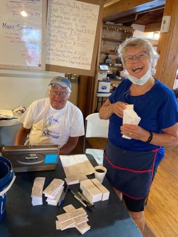 Brian Cronin and Dorothee Newcombe share a laugh.