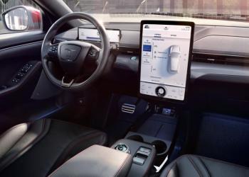 Tesla first put desk-size touchscreens in EVs, and other carmakers, including Ford, followed suit. Even seniors can easily use this one without reading glasses. The rotary knob on the console is the gear selector.