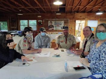 Troop 200 Camden table at the District dinner. Taylor Clayton, Heidi O'Donnell and Matthew Clayton. John Wood, Ed and Susan Weber. (Courtesy photo)