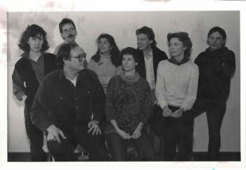 Some members of Artfellows, from left to right: Denise Remy, Stew Henderson, Richard Norton, Cathy Kaelin, Megan Pinette, Phil Kaelin, Janice Kasper, and Dennis Pinette posing for “School of Evocation” on New Years Day, 1985, in Belfast. (Photo courtesy Waterfall Arts)