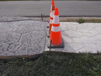 Not just a standard sidewalk, the quirky changes in pattern bring intrigue to a daily walk. (Photo by Sarah Thompson)