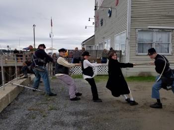 Working together across the centuries: Some of the youth who helped pull a sunk sailboat out of Belfast Harbor on October 2. The group was led by AmeriCorps member Jack Deslippe. Participants are (L-R): Ethan Cowan, 16; Jesse Cowan, 17; Shi McLellan, 14, Sylis Littlefield, 15, Desmin Littlefield, 16. (Photo courtesy I Know ME)