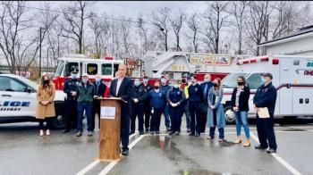The Belfast Fire and Ambulance Department, along with city officials, announce at a Nov. 18, 2021 that the city will increase pay and benefits for first responders. (Photo courtesy Mackenzie Barnhart/City of Belfast)