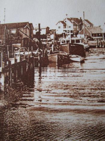 Harbor Scene by Sandi Cirillo, solar plate etching. Courtesy of Friends of Maine Coastal Islands Wildlife Refuge.