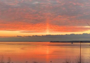 Sunrise over the Rockland Breakwater, December 1. (Photo by Cathy Trueman)