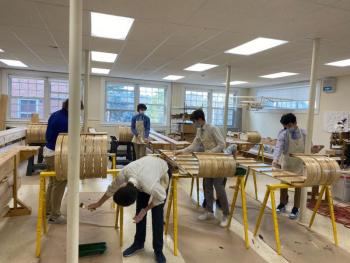 Working on building the toboggans. Photo courtesy Tyson Trautz