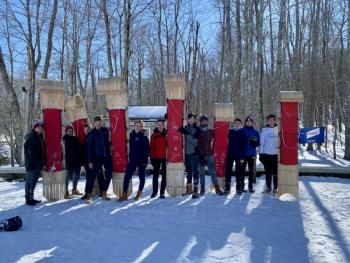 The entire class and their toboggans. Photo courtesy George Tahan