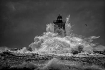 “Storming the LIght” by Richard Reynolds is among the B&W images in the 17th Maine Photography Show. Courtesy of MPS Richard Reynolds